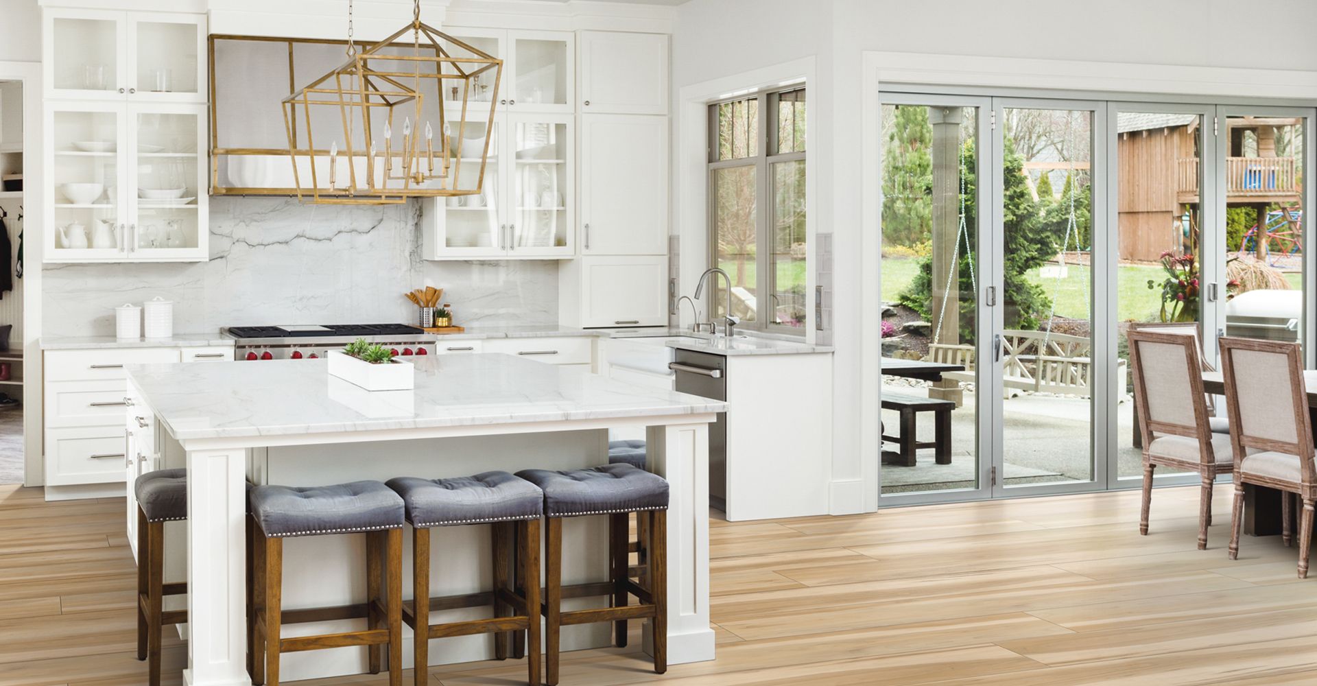 kids playing on newly installed Carpet One vinyl flooring in playroom